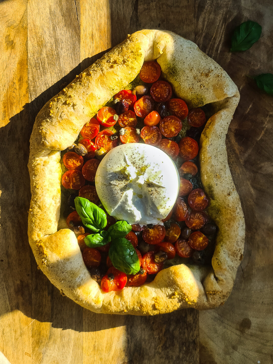 Bizar lekkere Tomatenpizza met Burrata en Pesto